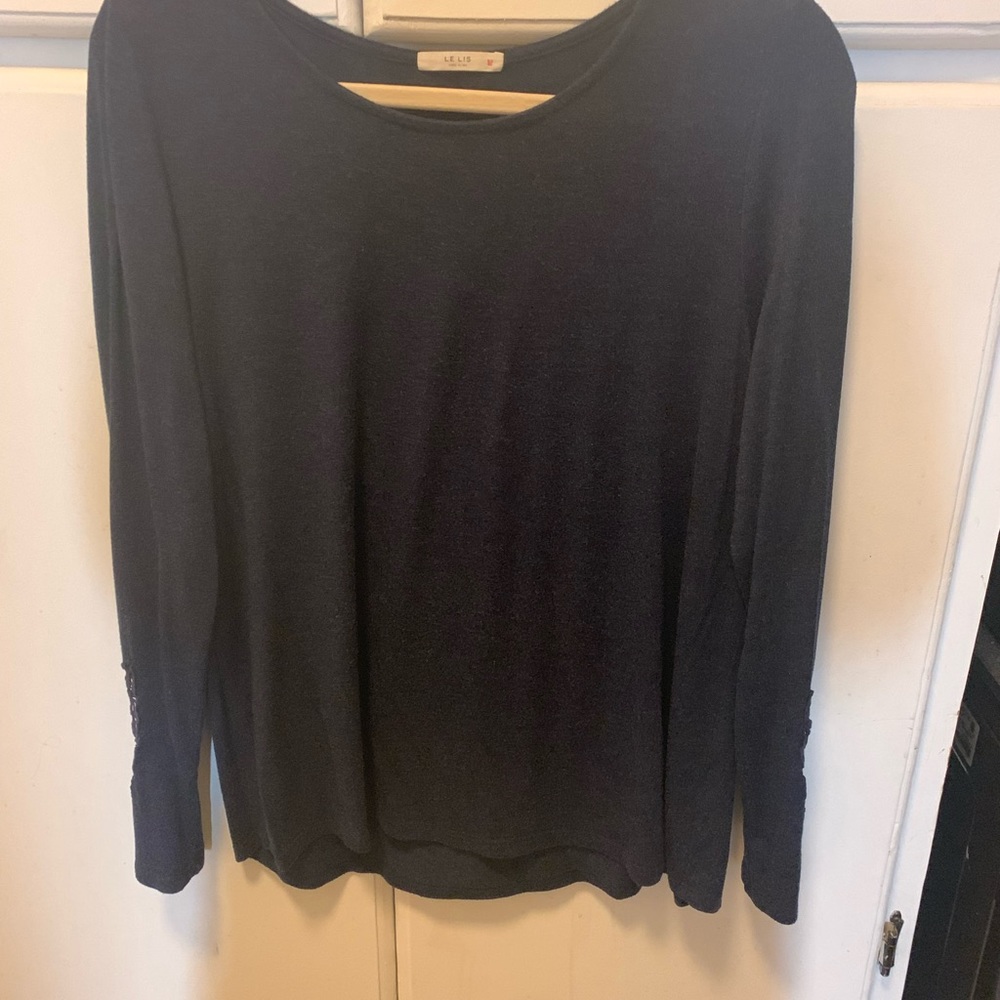 Le lis blue top with cut out detail around wrists